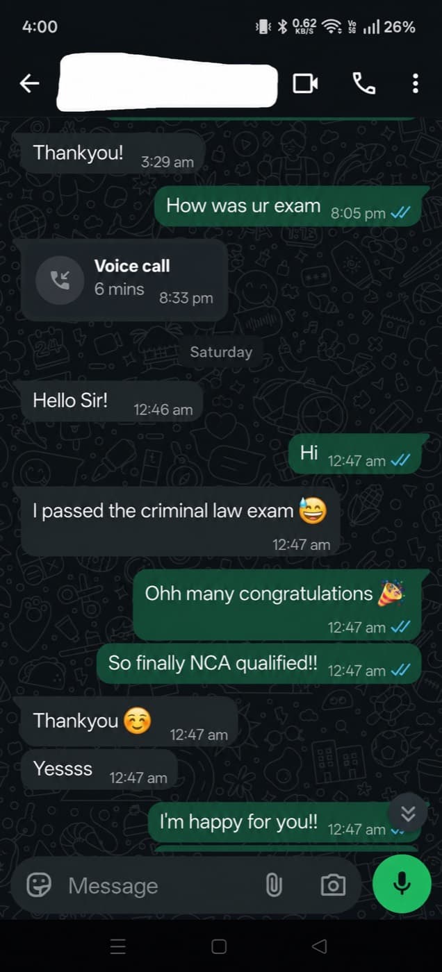 WhatsApp exchange where a student reports passing the Canadian Criminal Law exam and is congratulated on becoming NCA qualified.